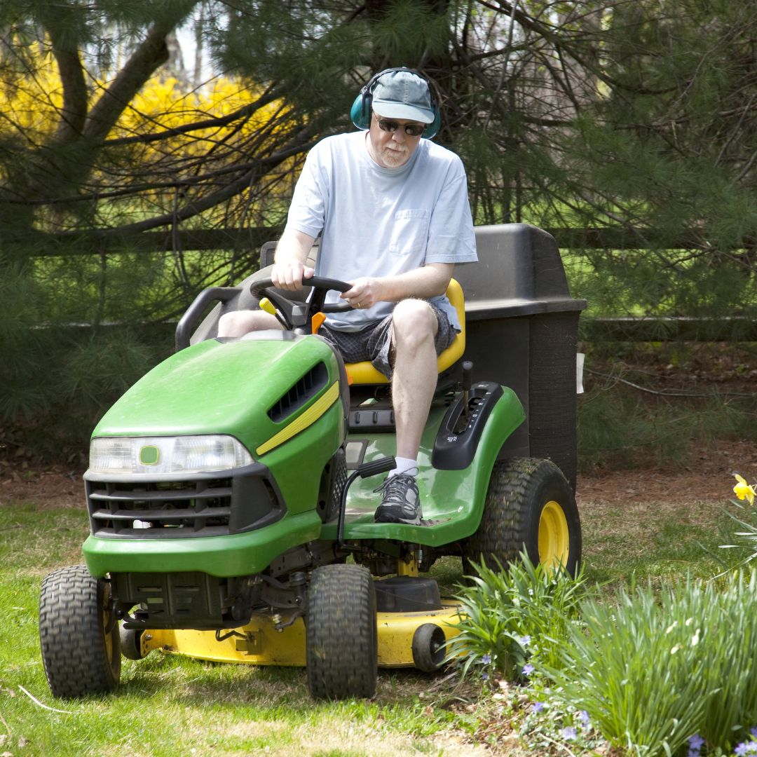 person mowing lawn person mowing lawn